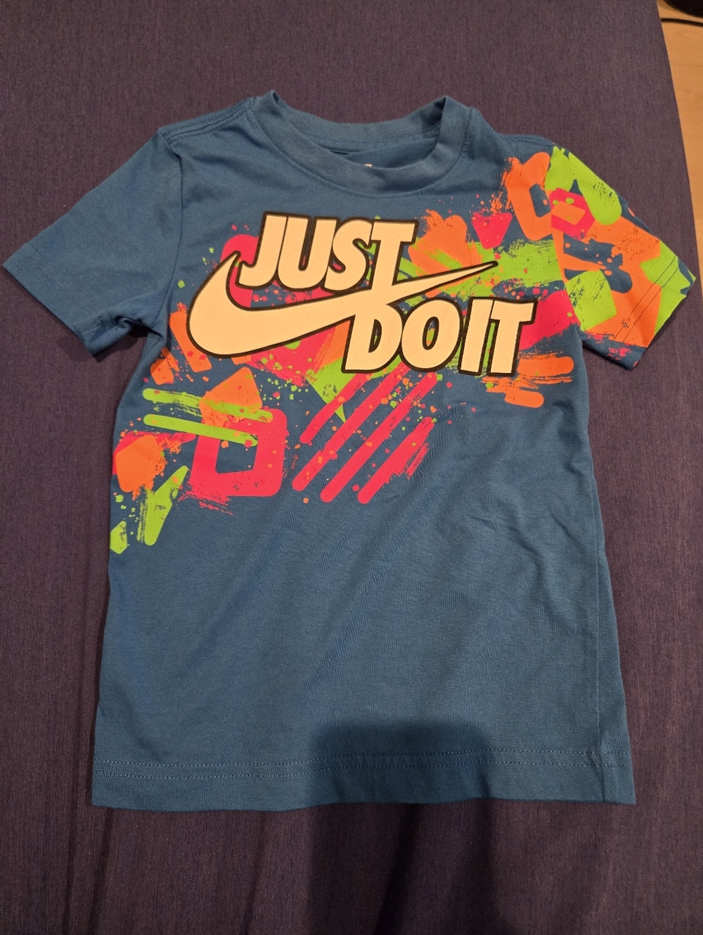 Nike Blue Tee with Neon 'Just Do It' Graphic